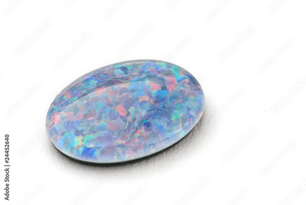A light blue opal against a white background