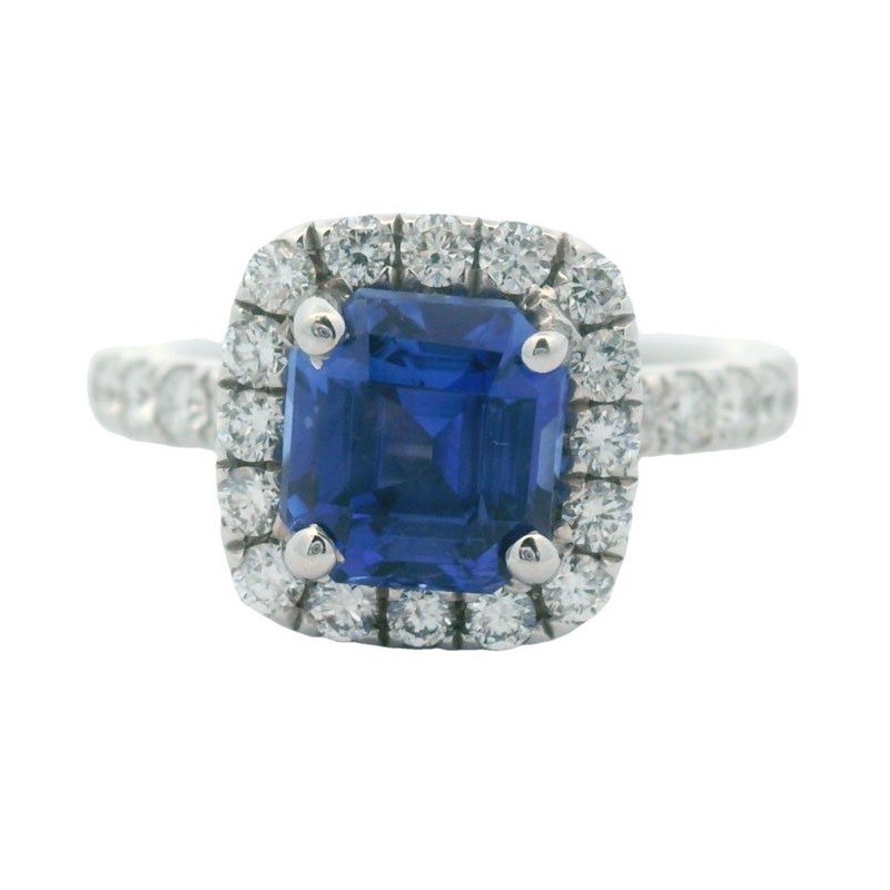 Blue Sapphire and Diamond Halo Ring in 18K White Gold